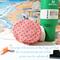 The bottom of an orange and white print water bottle bag is displayed with a Stanley Quencher 40 ounce, a cell phone, money and chap stick.
